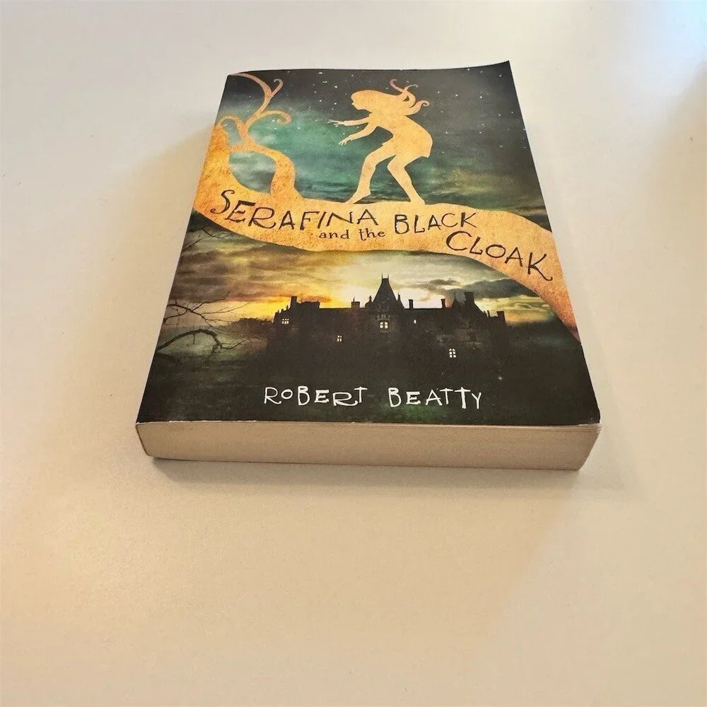 Serafina and the Black Cloak Paperback Book by Robert Beatty Scholastic